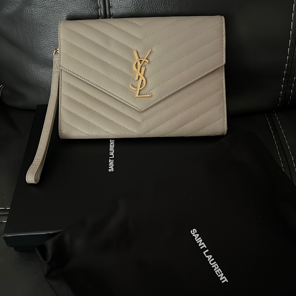Yves Saint Laurent Beige Clutch with Gold Logo